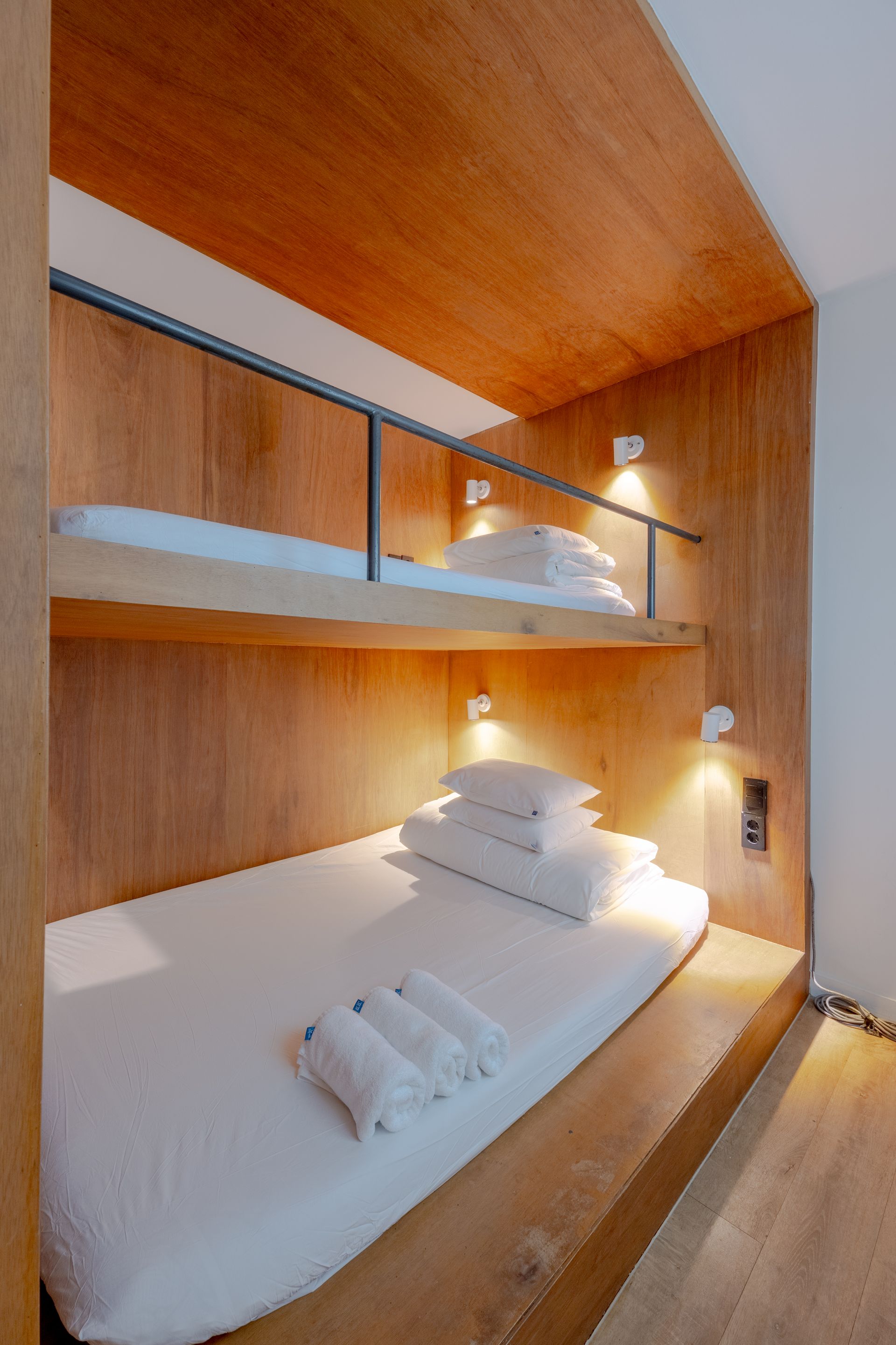 A bunk bed with a double bed on lower level, single bed on upper level. Triple Room - PIPE Hostel Yeonnam