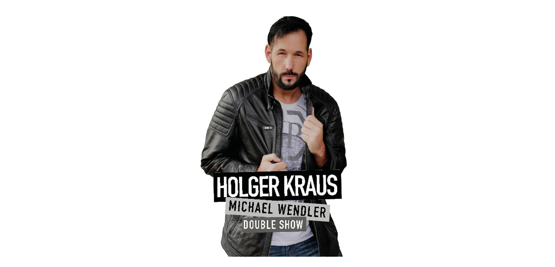 Ein Mann mit Bart trägt eine schwarze Lederjacke.