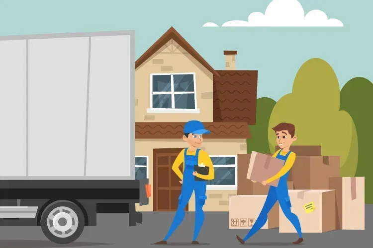 Deux personnes qui chargent un camion de démanagement.