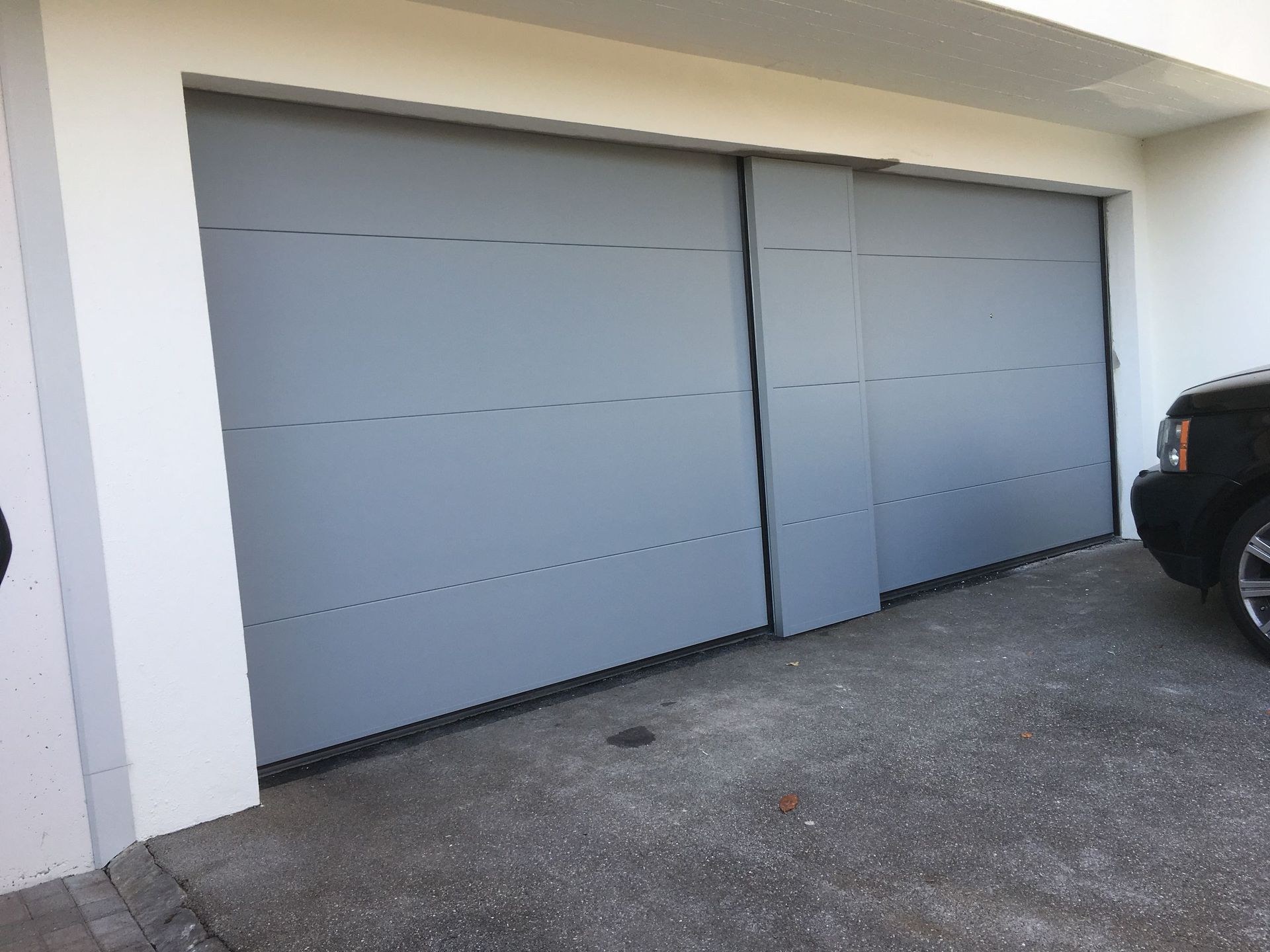 Sektionaltor mit Abdeckung Küsnacht - Blank Technik GmbH