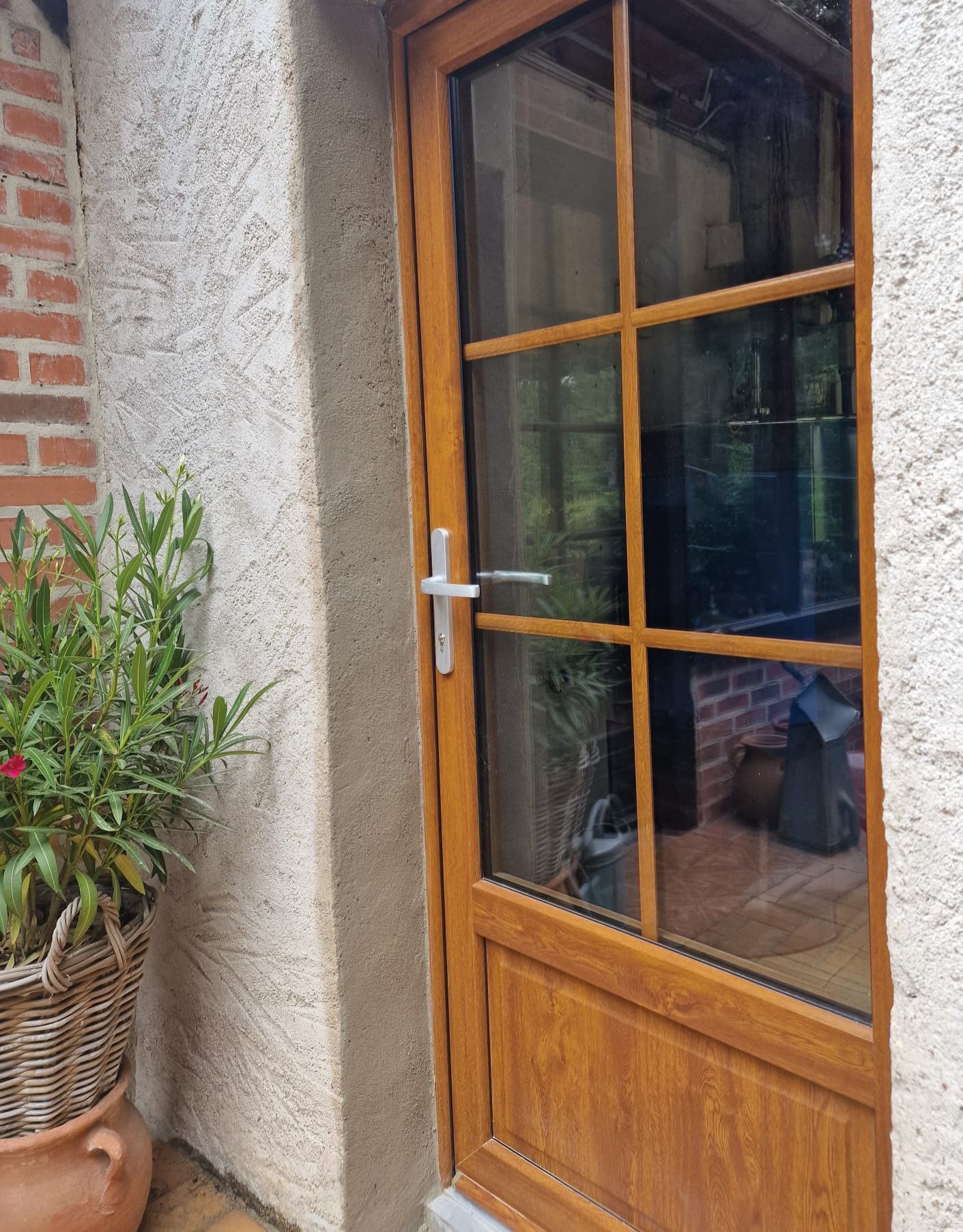 Porte d'entrée vitrée en bois