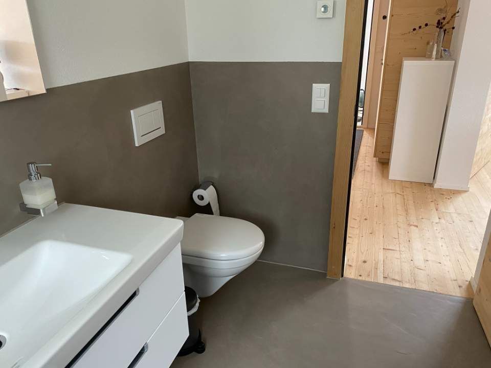 Toilette in Beton-Optik