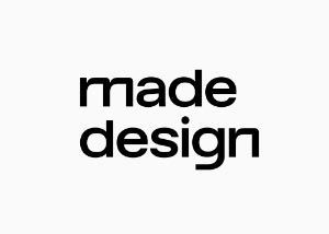 Inscription blanche « design réalisé » sur fond noir.