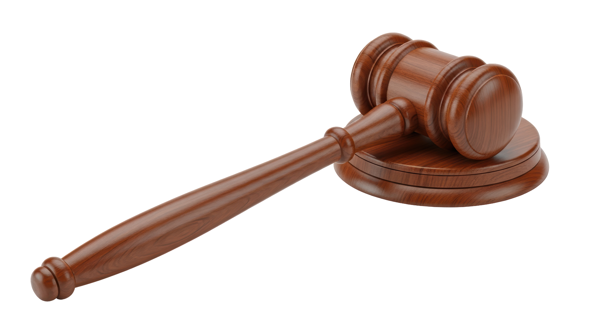 Maillet en bois sur un bloc de bois rond.