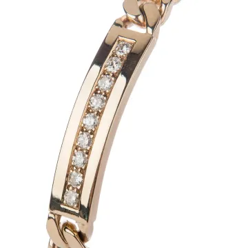 Pulsera de oro con una hilera de piedras transparentes en el centro.