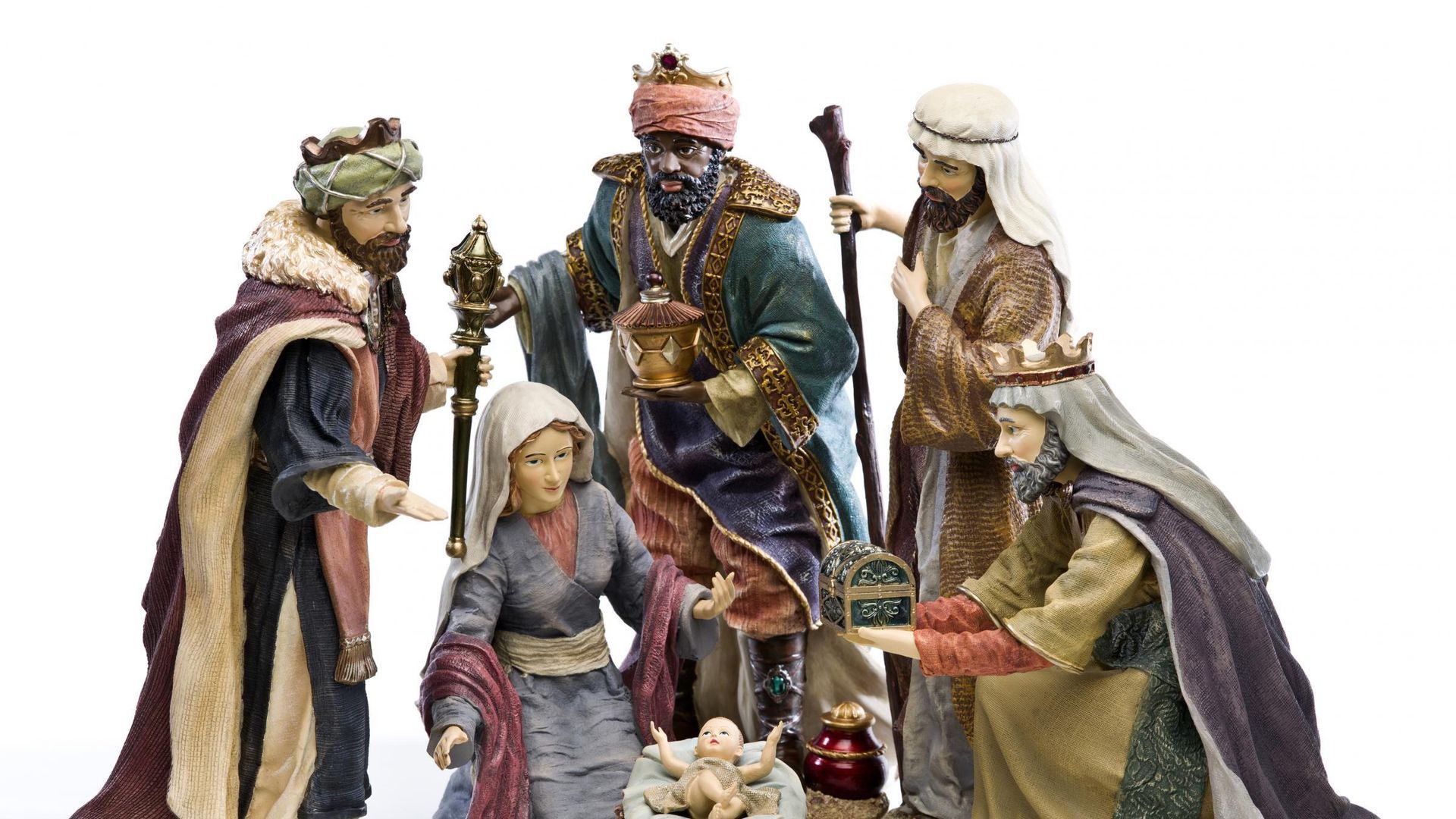 Weihnachtsszene: Die Heiligen Drei Könige überreichen Maria und dem Jesuskind Geschenke.