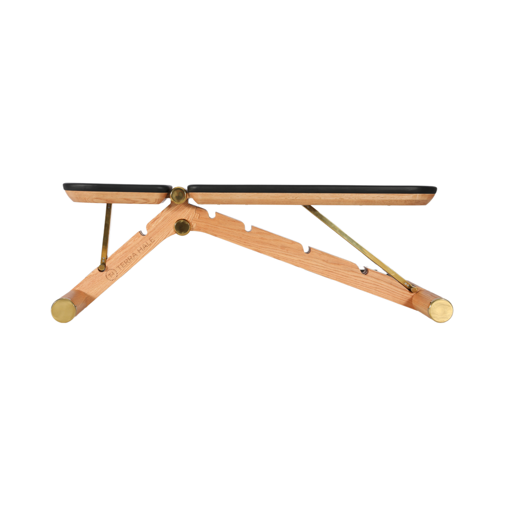 Terra Hale Gym Design : A wooden bench with a black seat on a white background.