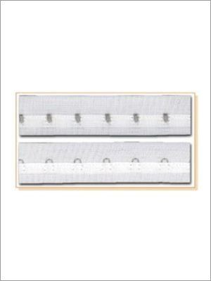 Juego de cierre de ganchos y ojales de color blanco para ropa.