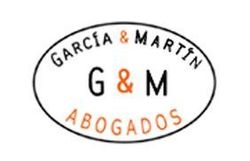 A logo for garcia & martin g & m abogados