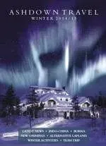 Ashdown Travel winter brochure cover with a snowy lodge under the aurora borealis.