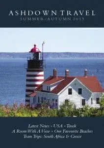 Ashdown Travel brochure cover with a lighthouse and house by the sea; summer/autumn 2015.