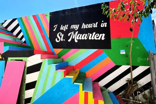 Colorful mural in St. Maarten with the words