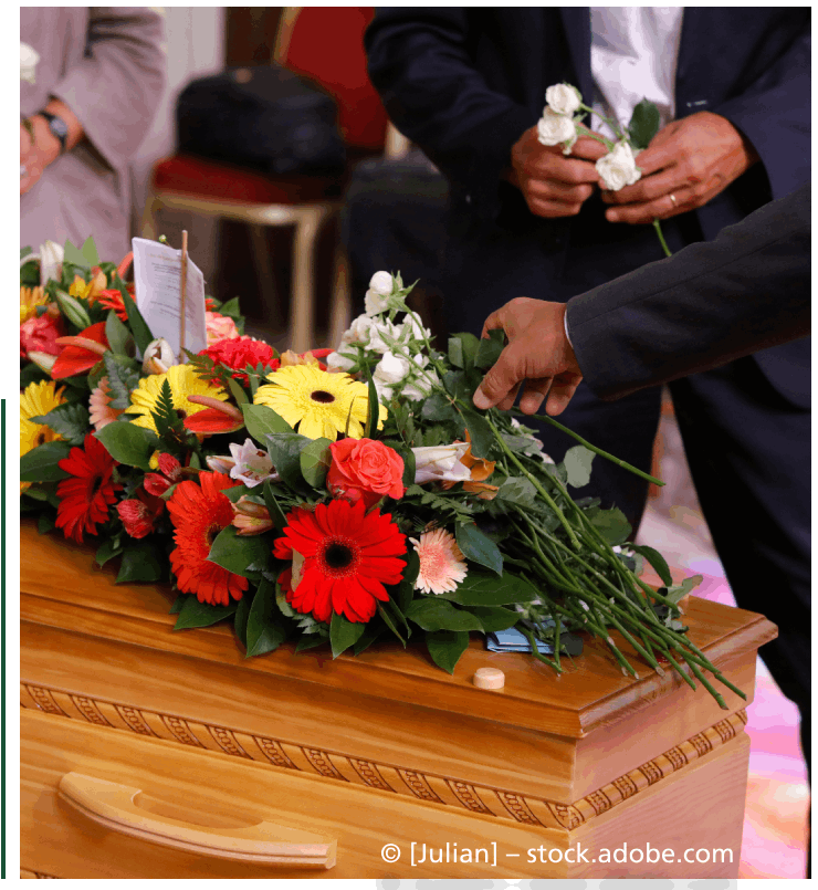 Blumen auf Sarg