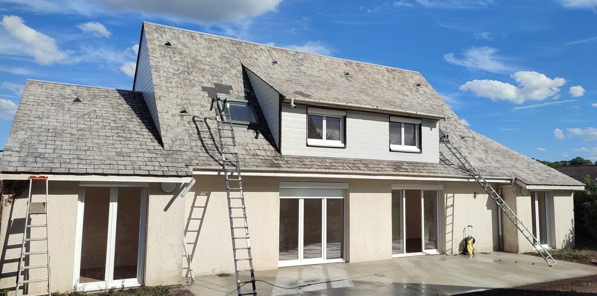 Démoussage de toit pendant