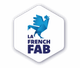 Logo de coq bleu avec le texte « LA FRENCH FAB » à l'intérieur d'un hexagone blanc