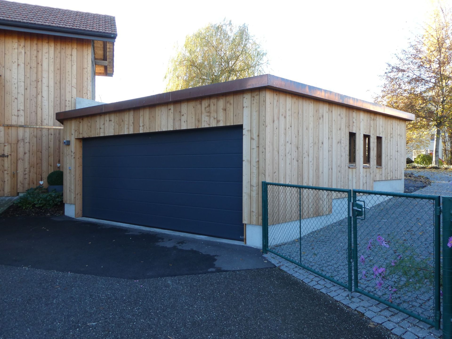 Façade lames en mélèze - Menuiserie-Agencement Eloi Bosson