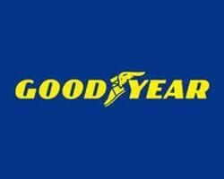 Logotipo da Goodyear com texto amarelo e sapato alado sobre fundo azul.