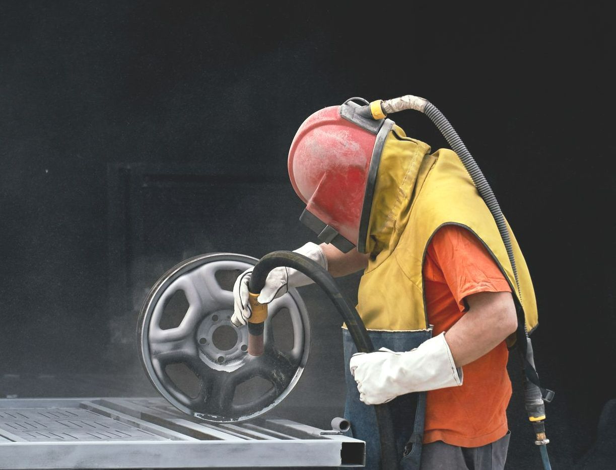 Sablage d'une jante auto