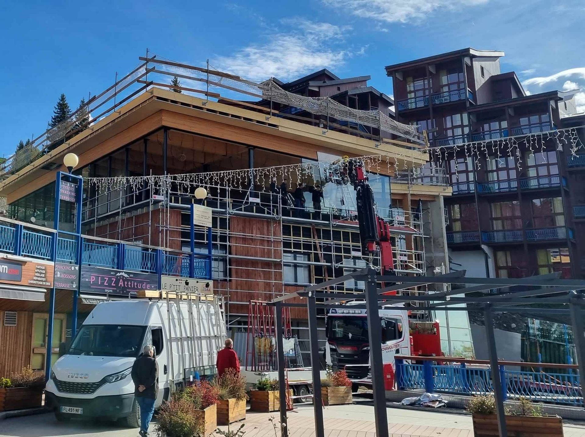 Réalisation d'une pose vitrages sur un petite immeuble