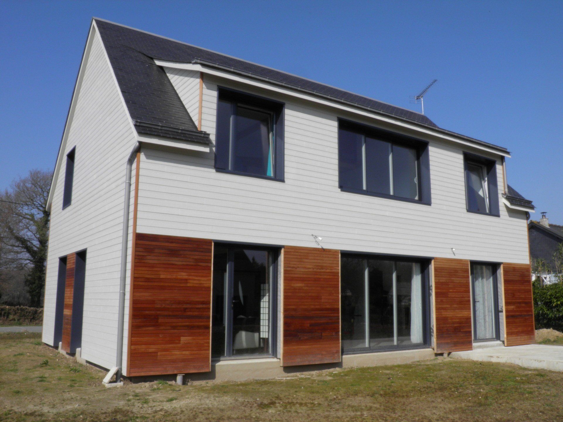 Maison ossature bois et bardage naturel ou peint