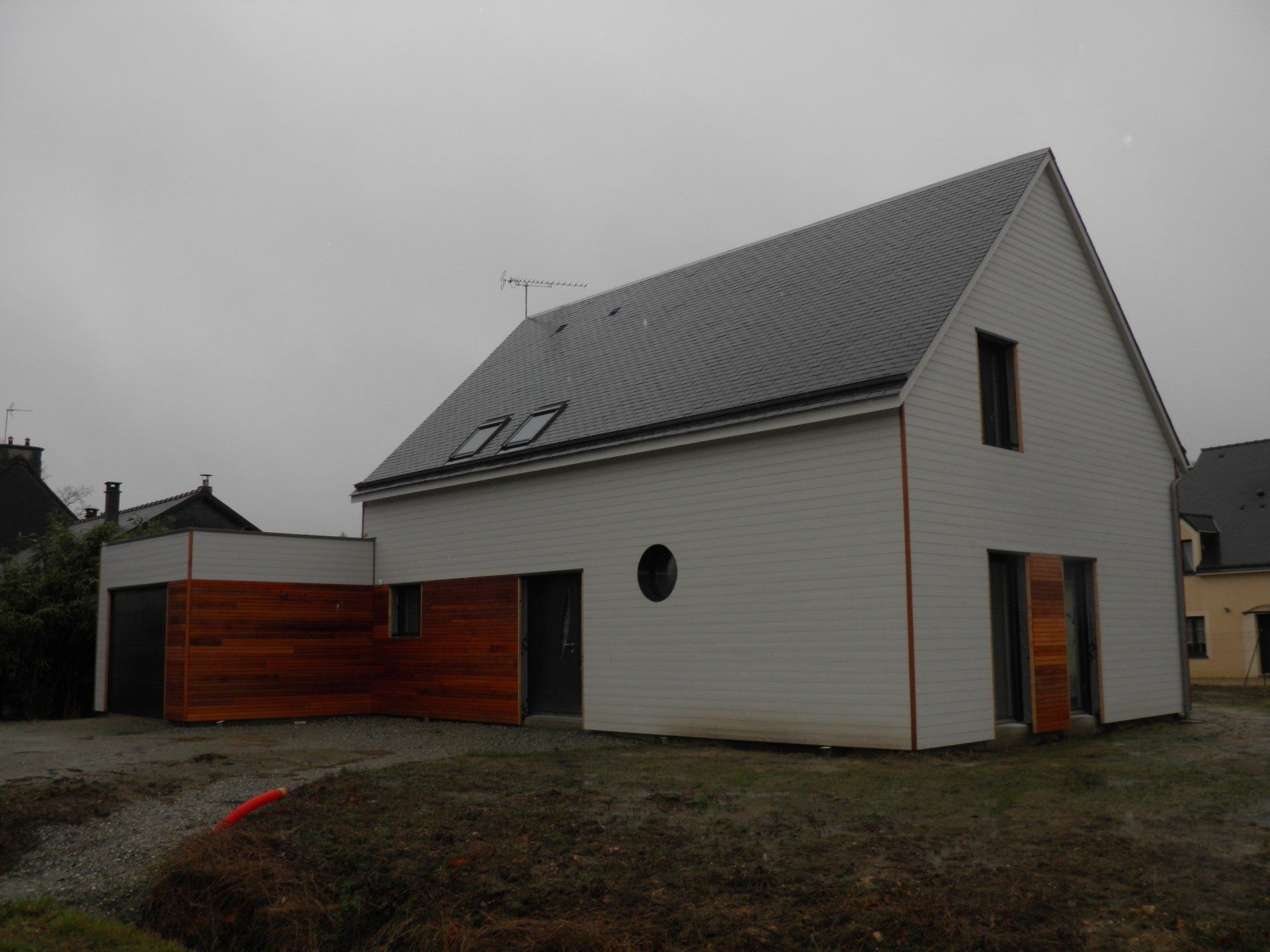 Maison ossature bois et bardage naturel ou peint