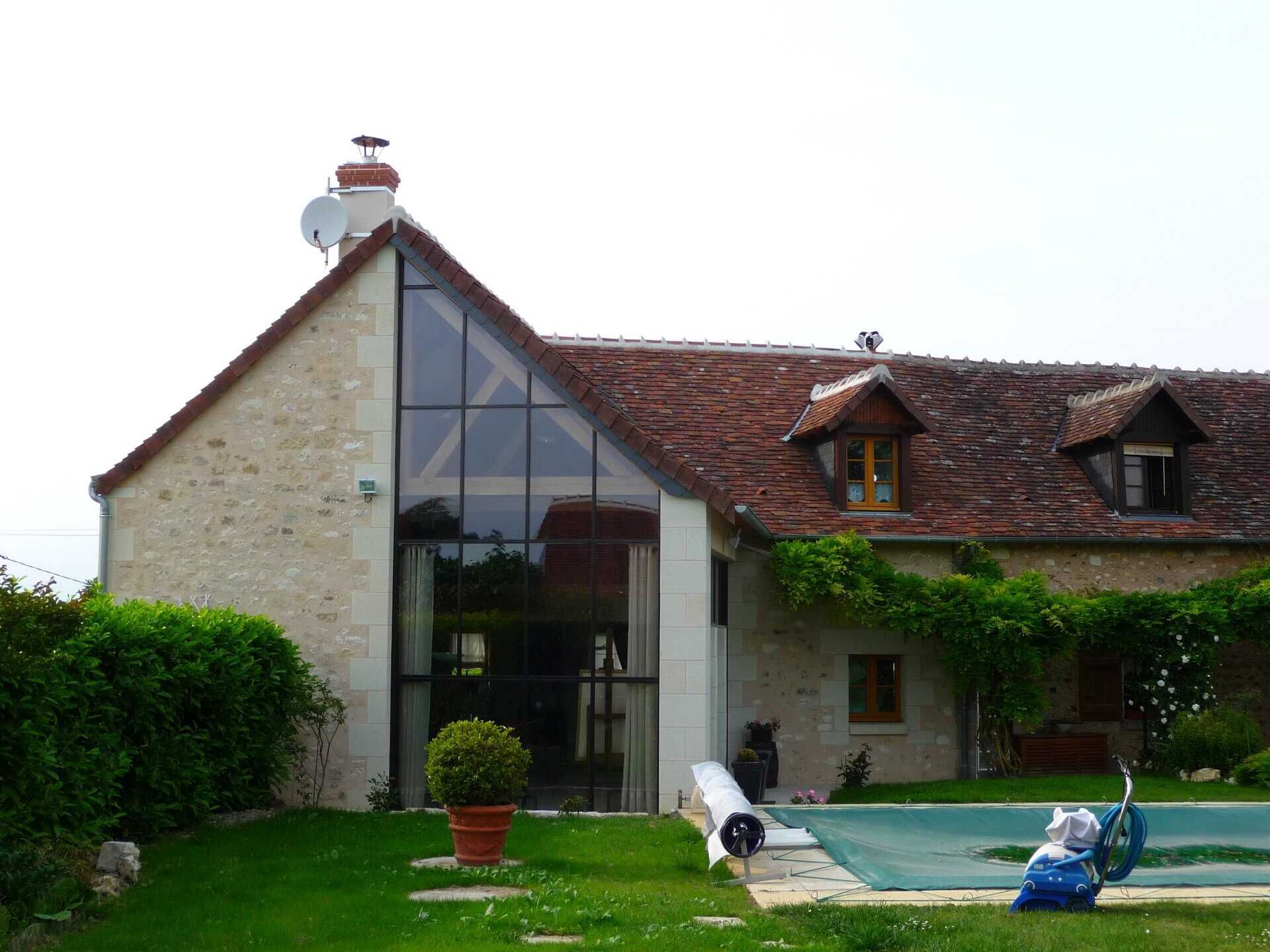 Maison d'habitation avec pignon à demi vitrée