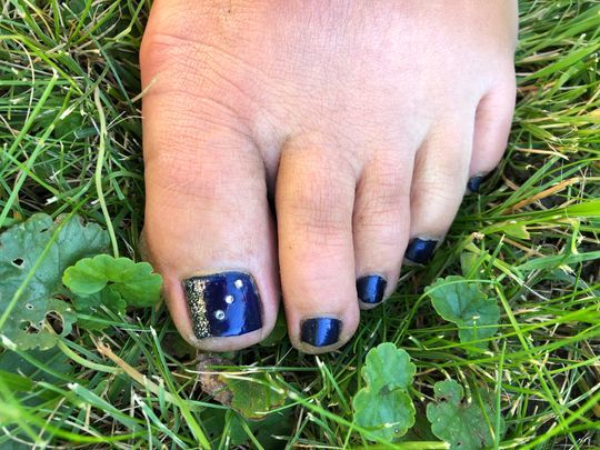 Lackierte Zehennägel - Fusspflegestudio