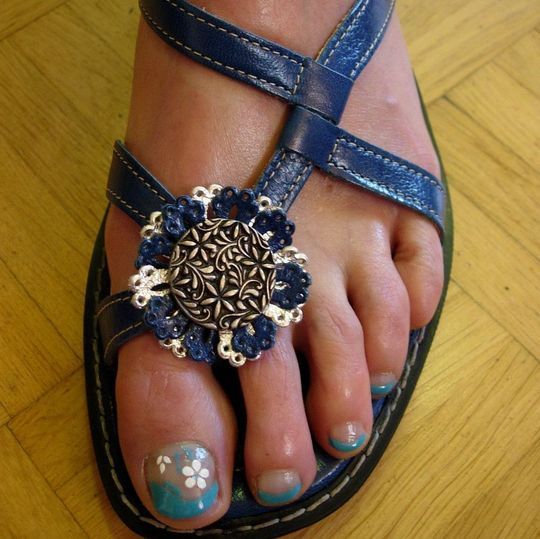 Lackierte Zehennägel - Fusspflegestudio