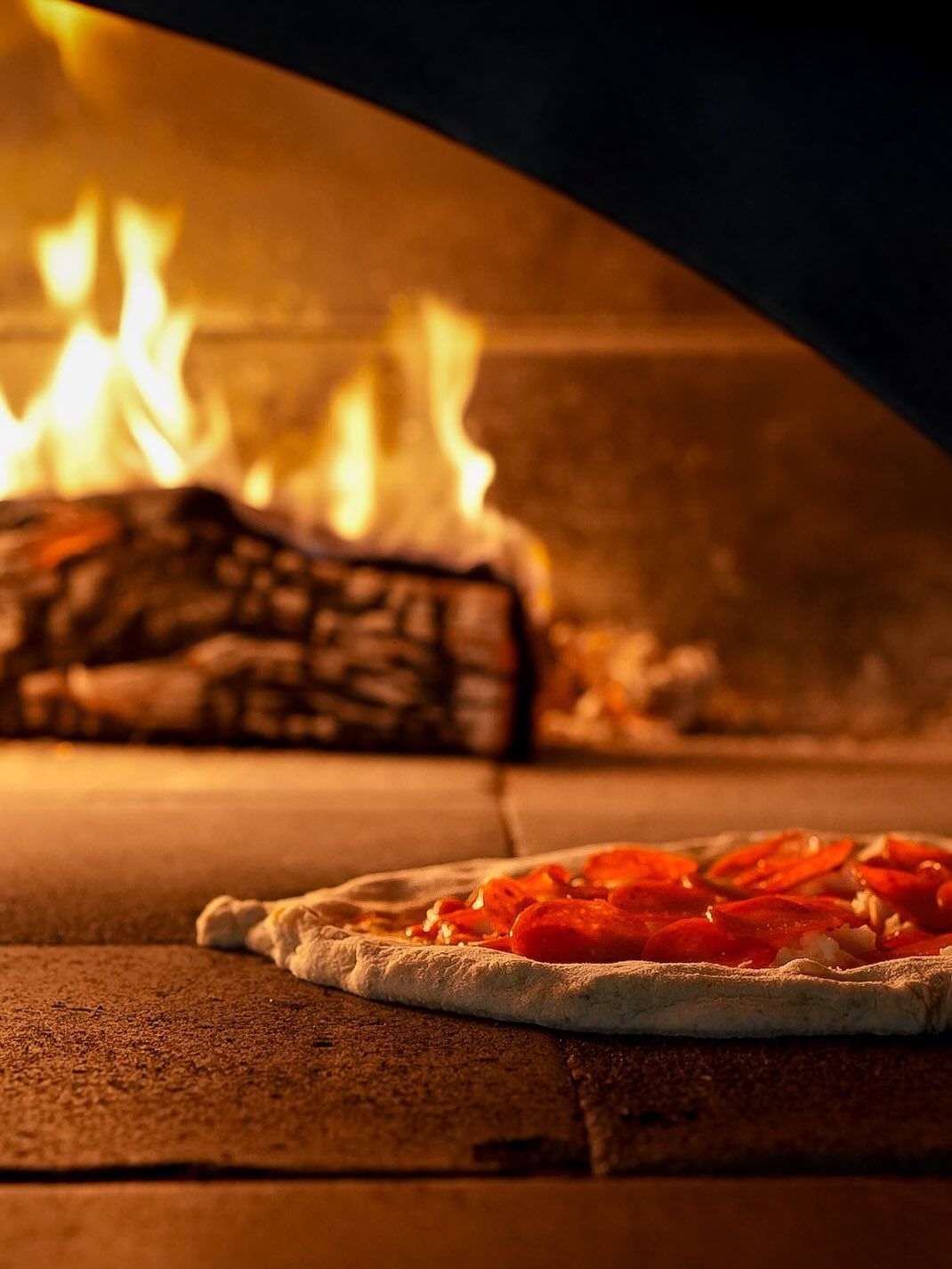 Pizza beside the wood-fired oven at Co.lectivo in Rincón