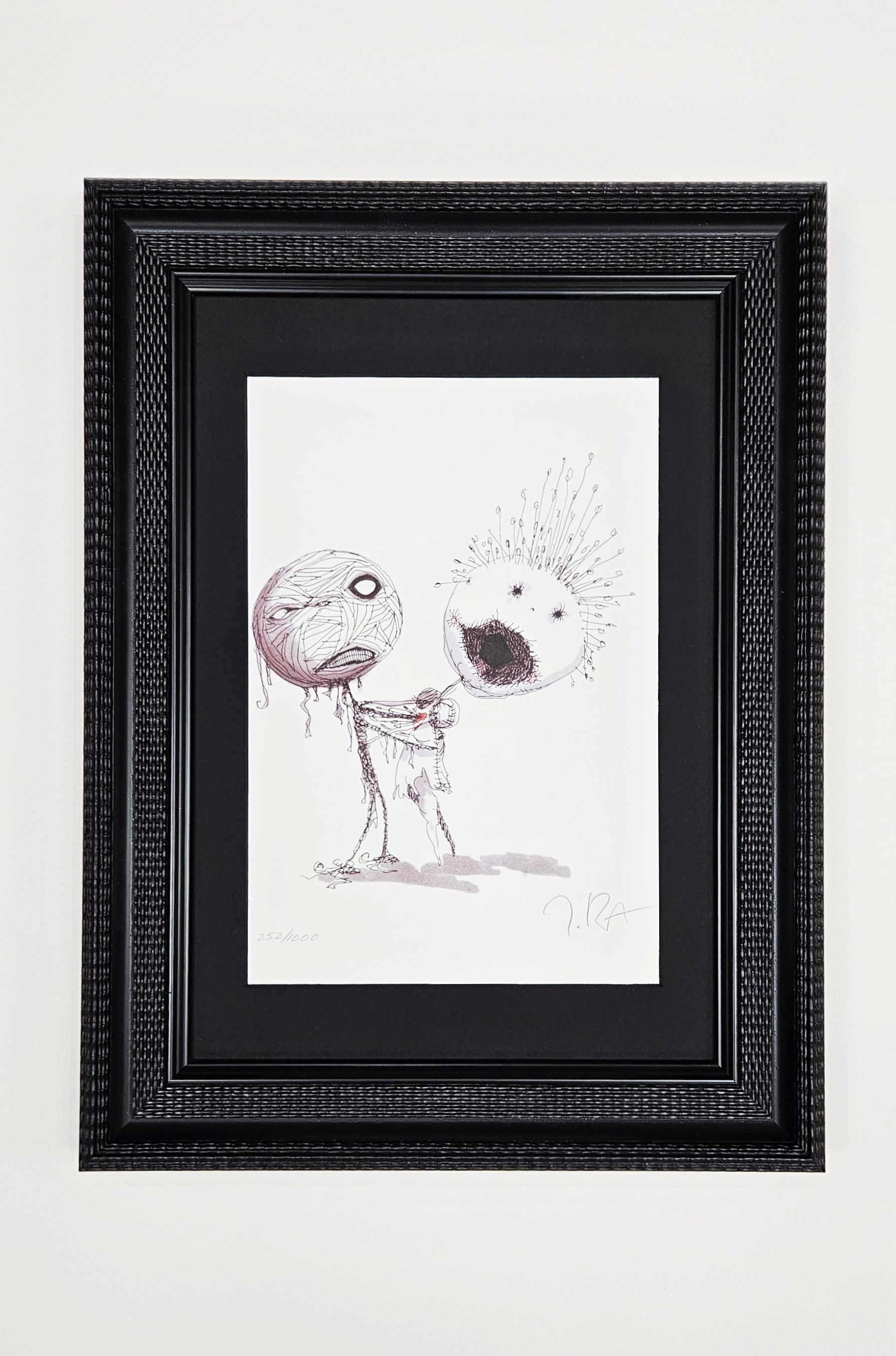 Dessin de deux personnages à la tête ronde