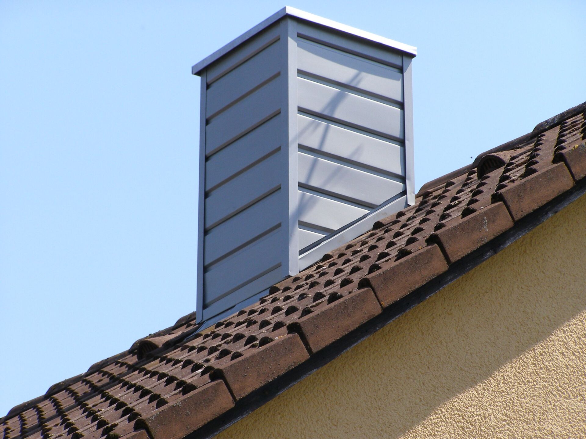 Rauchfang grau Schindeln