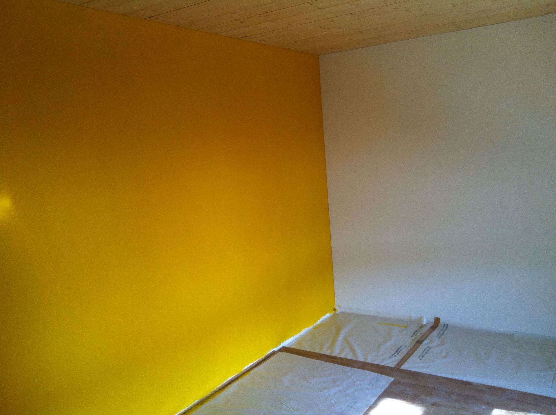 In Arbeit gelbe Wand - Malergeschäft Bugmann - Niederlenz