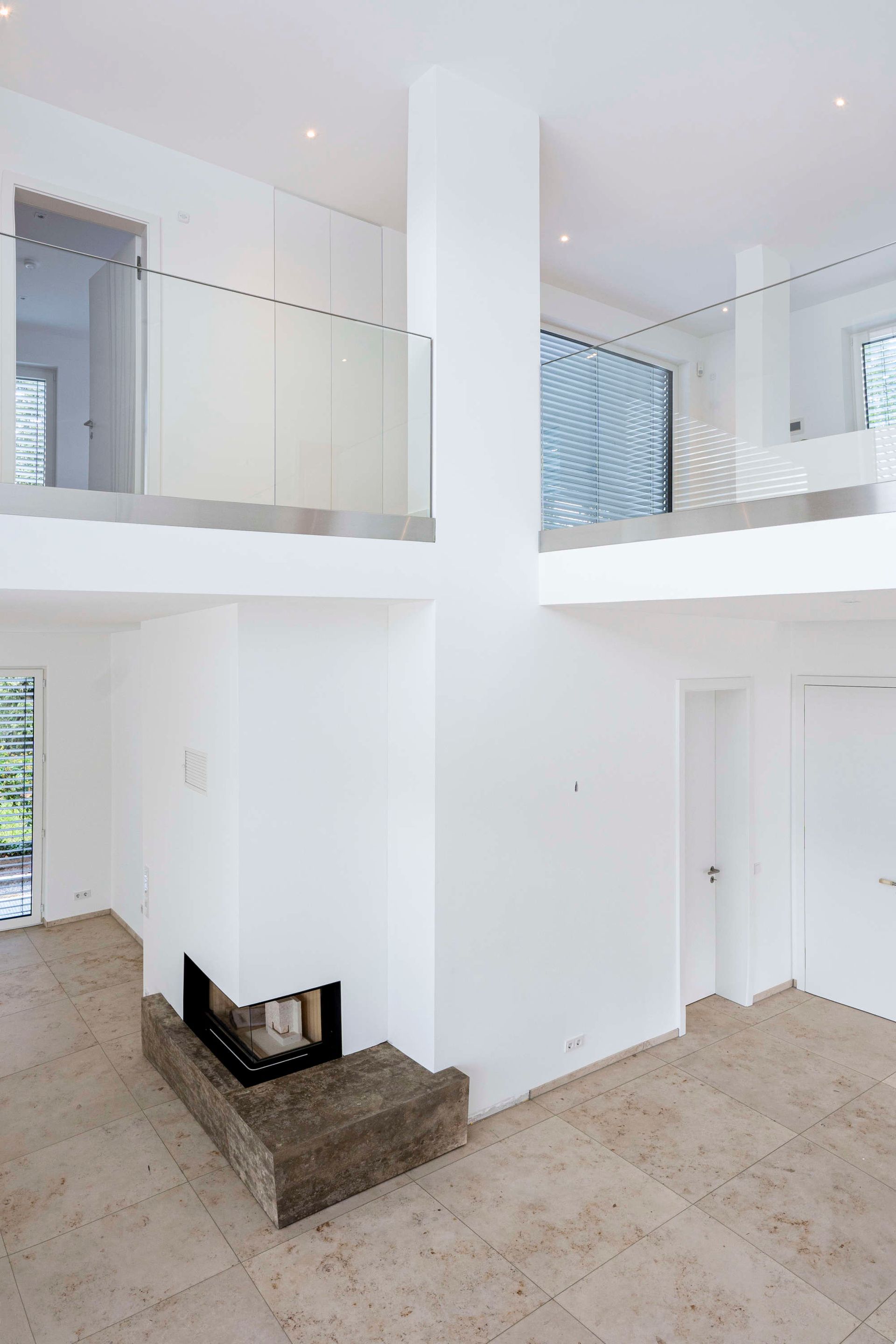 Bau von Maisonettewohnungen mit integrierten Kamin