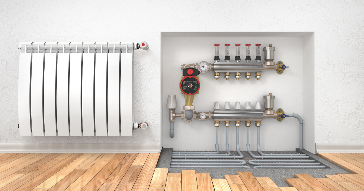 Una habitación con radiador y sistema de calefacción en el suelo.