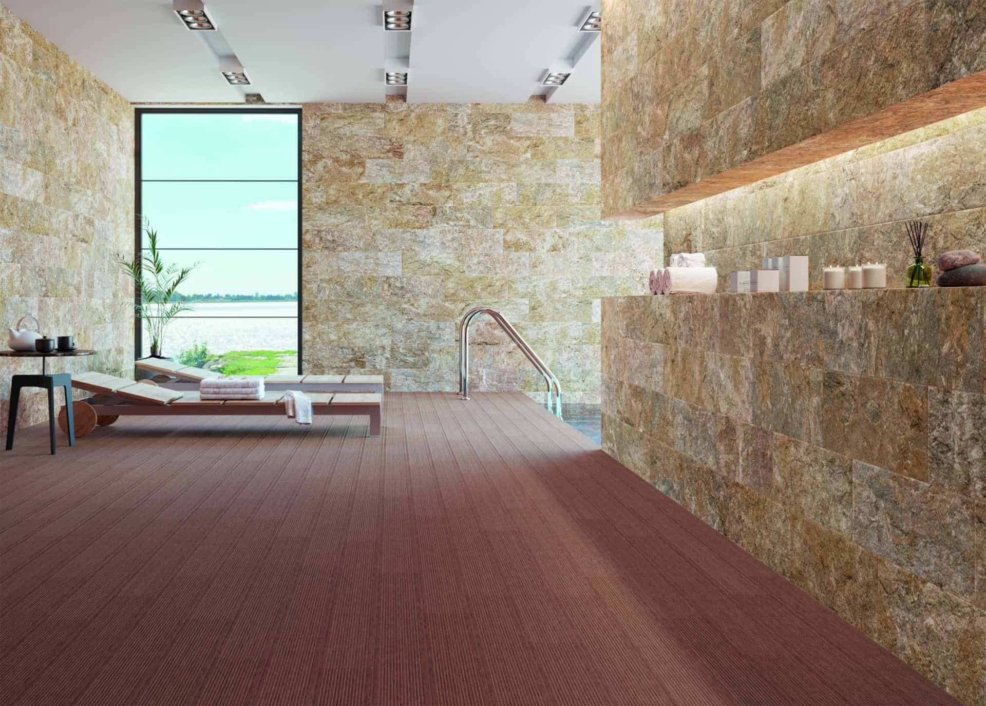 Una habitación grande con suelo de madera y una ventana grande.