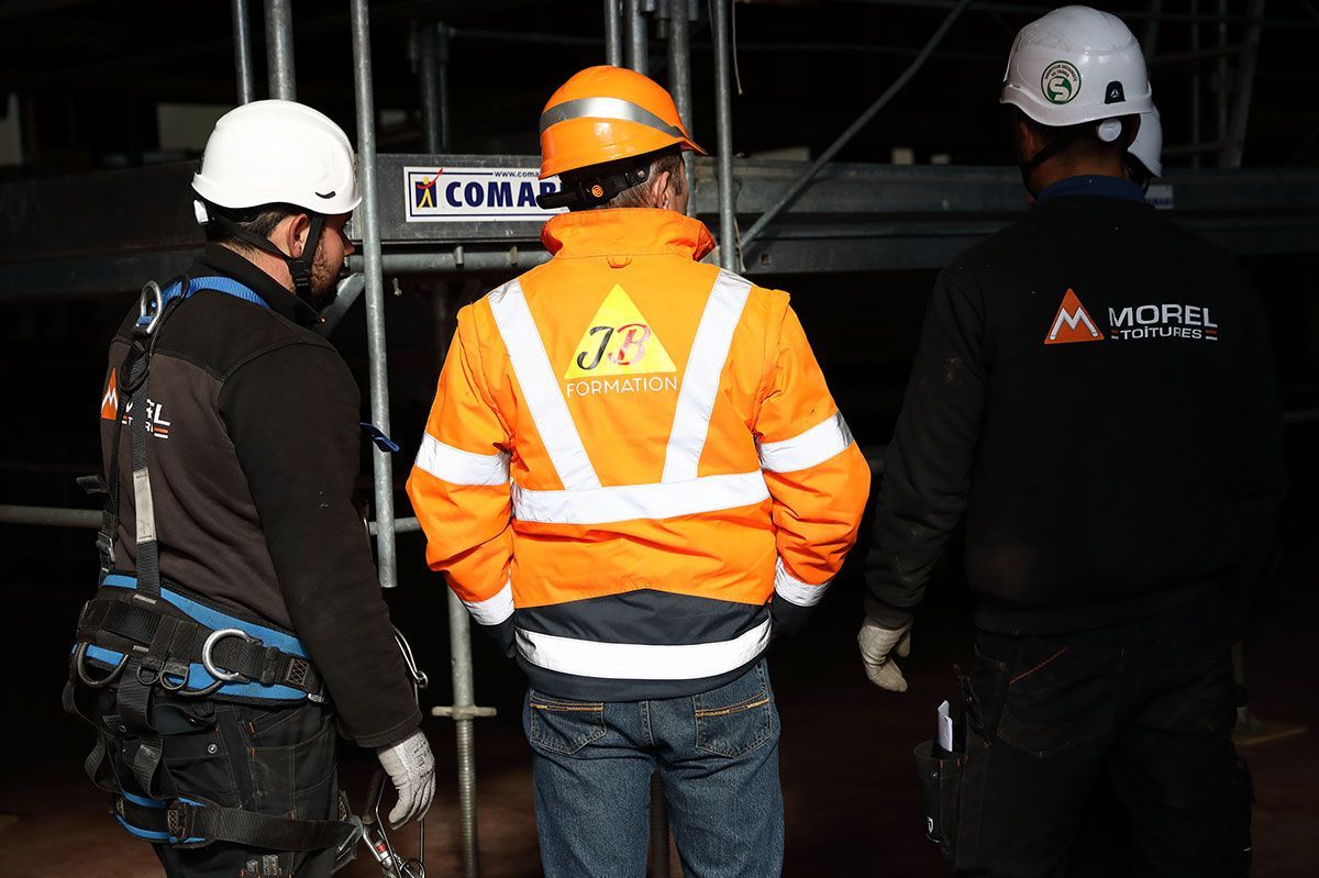 Trois ouvriers de l'entreprise Morel et Fils