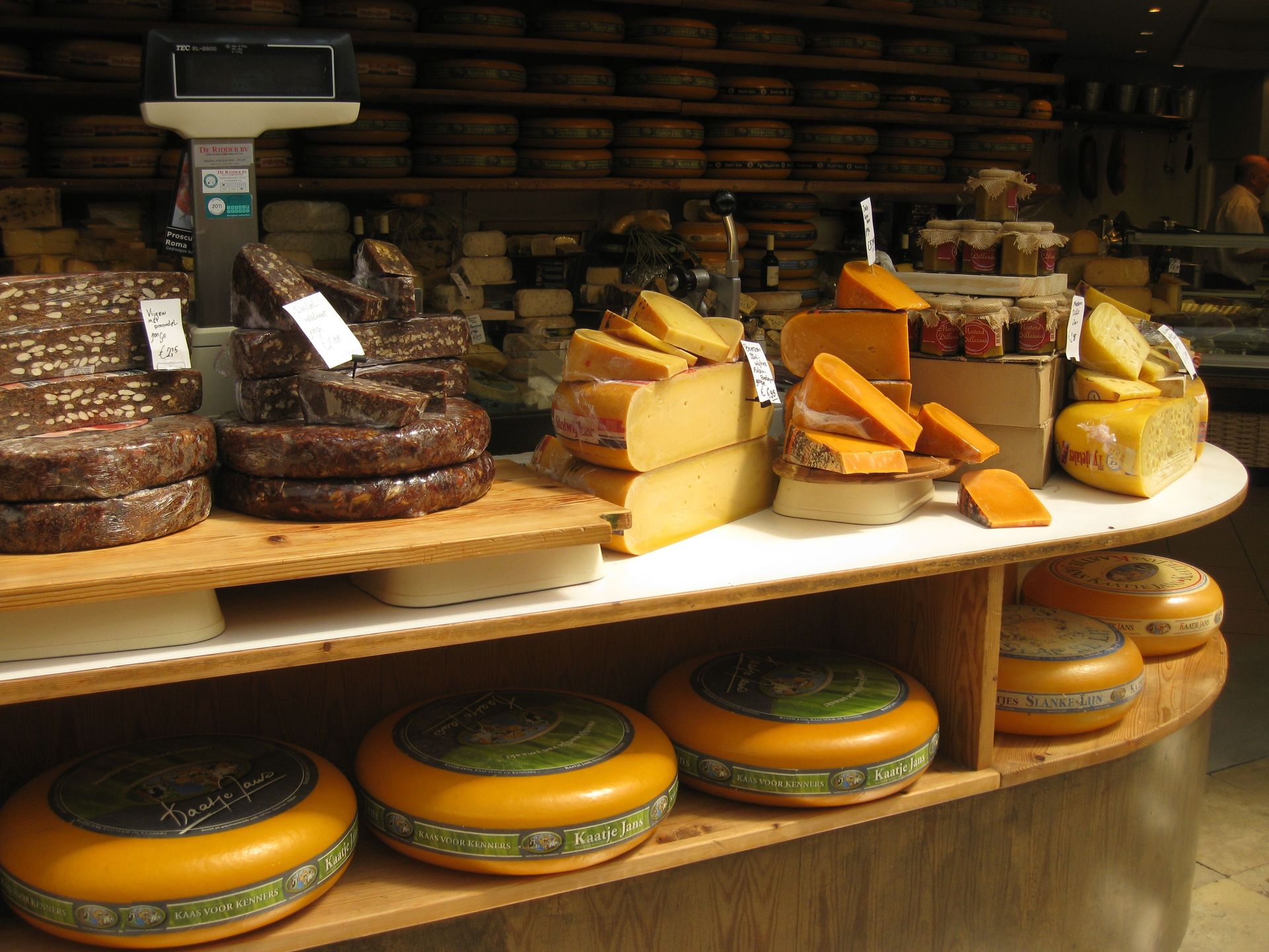 Artisan cheese on a deli counter at a food market
