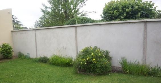 Mur de cloture enduit ciment