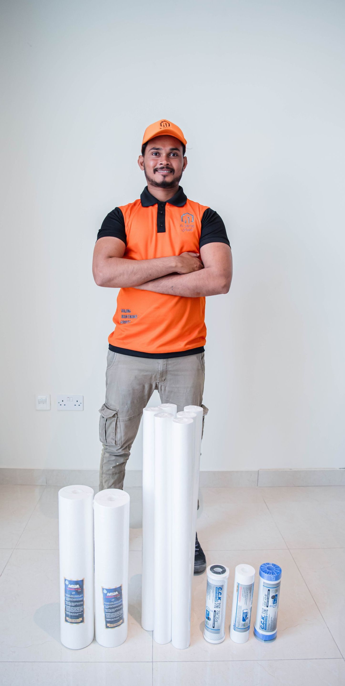 Company technicians group photo in uniforms – AC maintenance team in Qatar