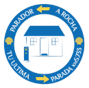 Letrero circular azul con "PARADOR A ROCHA", una casa y "TU ULTIMA PARADA KM 5.733".