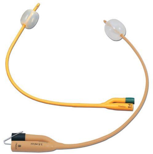 Two yellow and beige Foley catheters, medical devices with balloons, for urine drainage.
