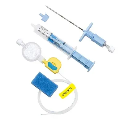 Medical kit with syringes, needles, tubing, and other instruments for a procedure.