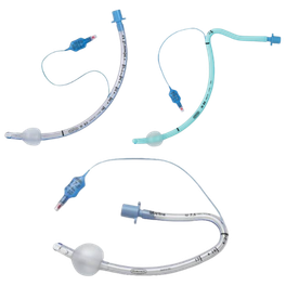 Three endotracheal tubes with various connectors. Two are white, one blue. One has a pilot balloon.
