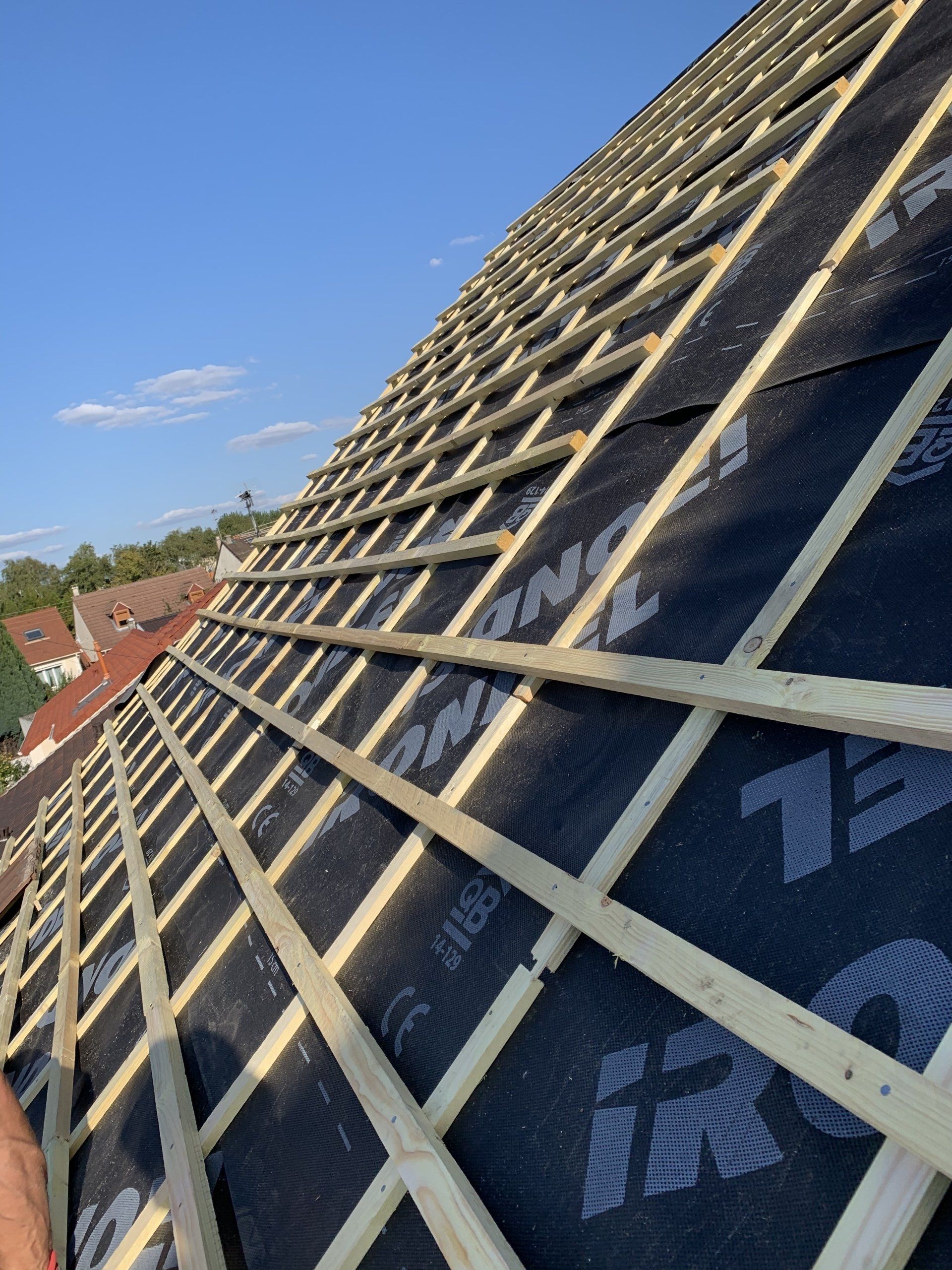 Pose d'isolation de couverture