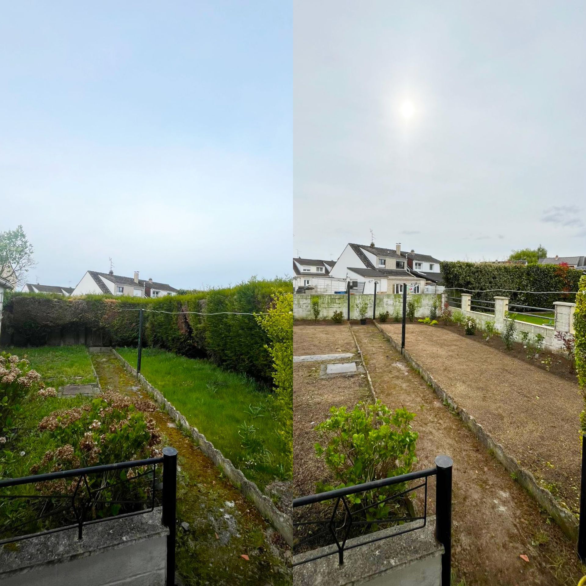 Vue depuis une fenêtre donnant sur une cour arrière avec des haies, des parterres de jardin nus et des maisons blanches.