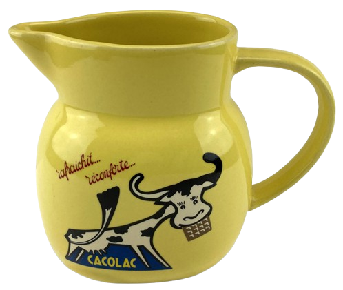 Pichet à lait Cacolat jaune orné d'une illustration de vache.
