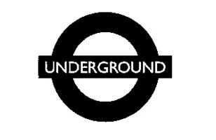 Logotipo circular negro del metro de Londres con la palabra "UNDERGROUND" en el centro.