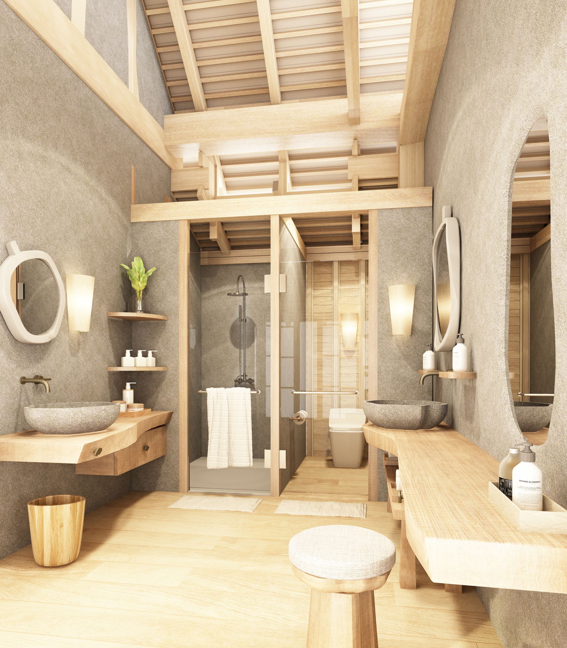 Salle de bains rustique avec des murs en pierre, accents en bois, lavabos, douche et toilettes.