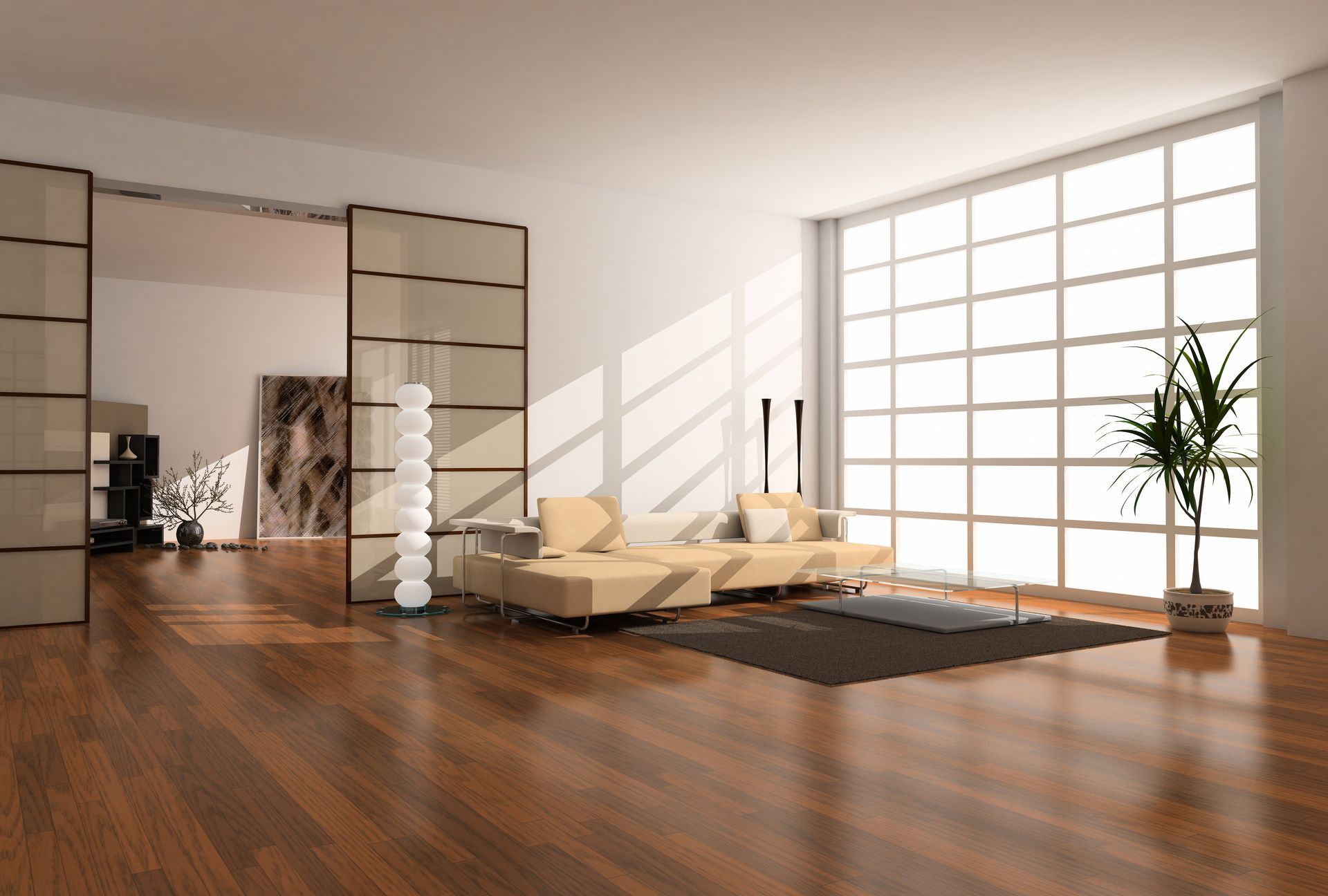 Salon moderne avec canapé sectionnel beige, grandes fenêtres et planchers de bois franc.