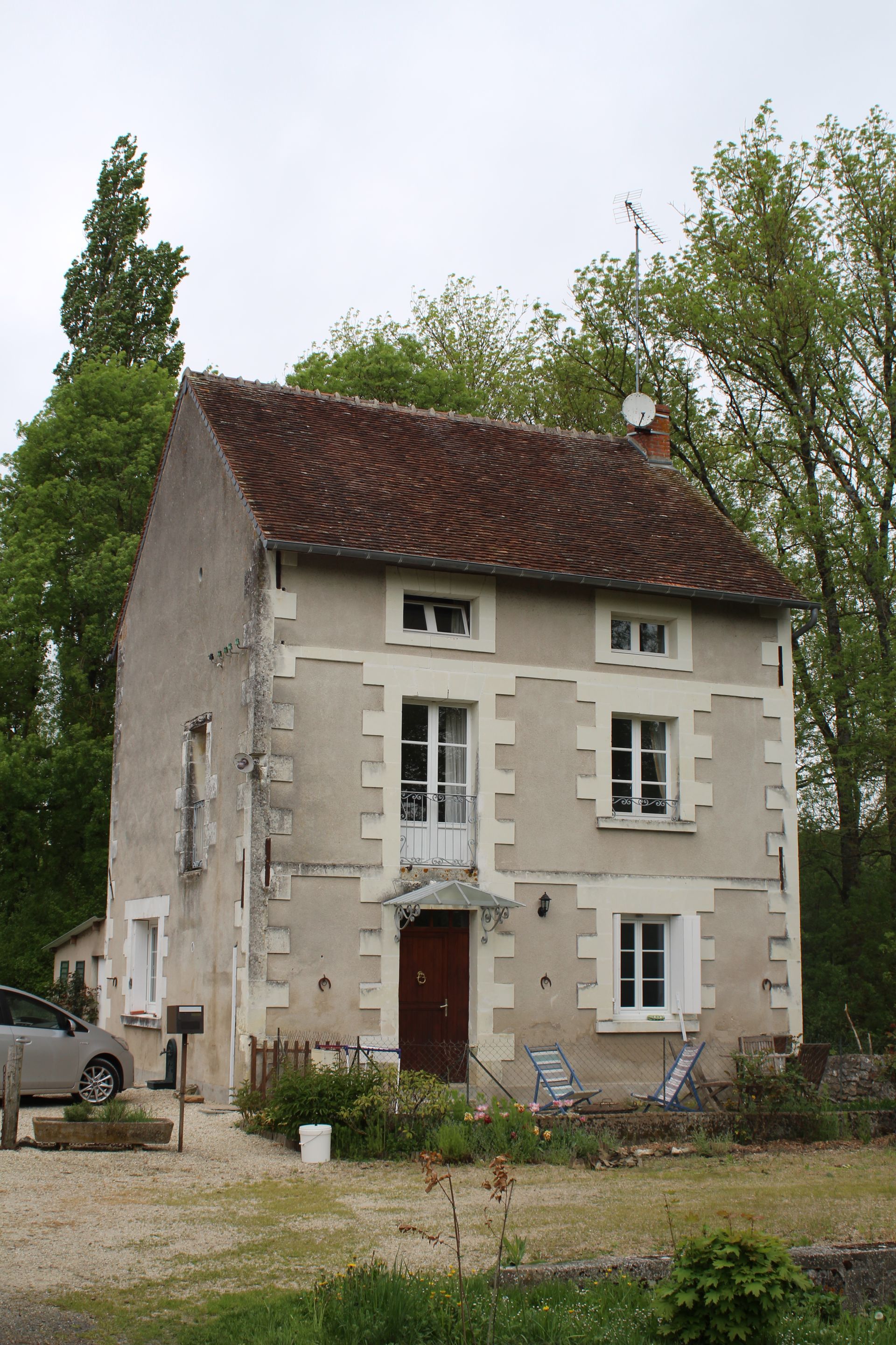 Façade d'un moulin avant travaux